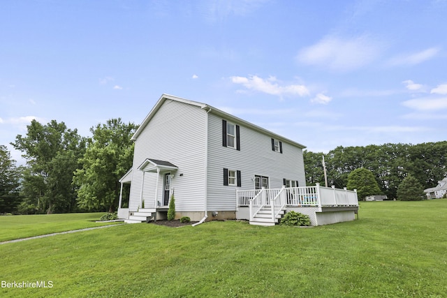 679 Middle Pownal Rd, Pownal, VT 05261 - rear view of property with a lawn and a deck