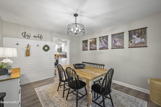 679 Middle Pownal Rd, Pownal, VT 05261 - dining space with a chandelier and dark wood-style floors