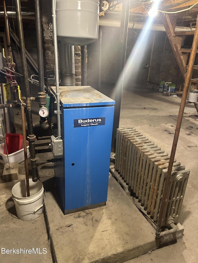 18 Crotteau St, Adams, MA 01220 - utilities with a heating unit