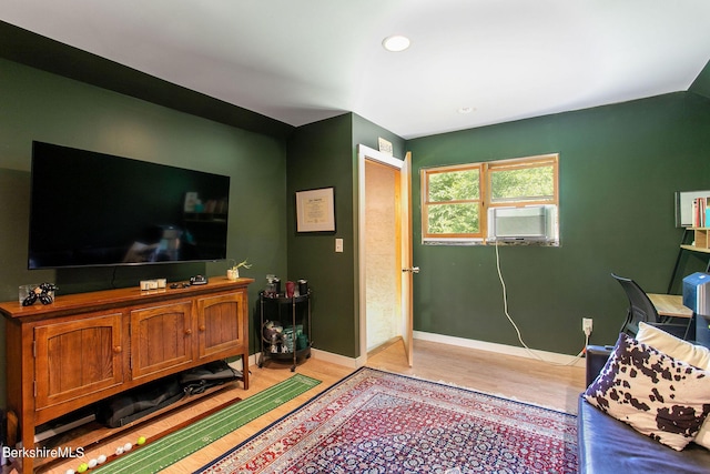 living room with light hardwood / wood-style floors