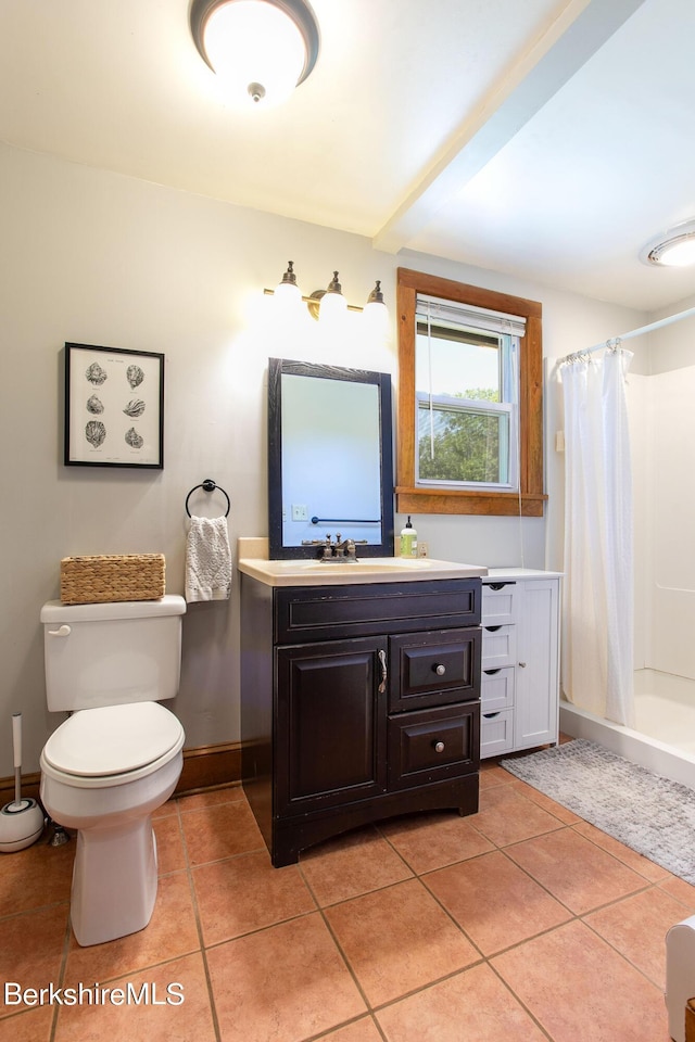 bathroom with a shower with curtain, toilet, tile patterned flooring, and vanity