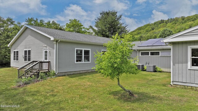458 Monterey Rd, Great Barrington, MA 01230 - back of house with a yard and central AC