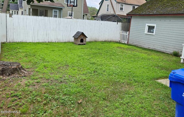 79 Marsden St, Springfield, MA 01109 - unfinished below grade area with washer / dryer and a heating unit