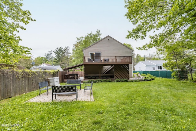 144 Brombach St, Pittsfield, MA 01201 - back of property featuring a patio and a wooden deck
