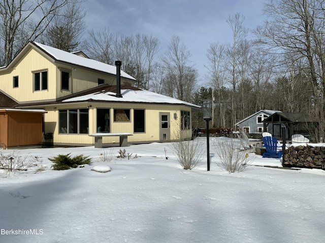 exterior space with an outbuilding