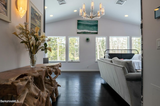 interior space featuring dark wood-style floors, plenty of natural light, and visible vents