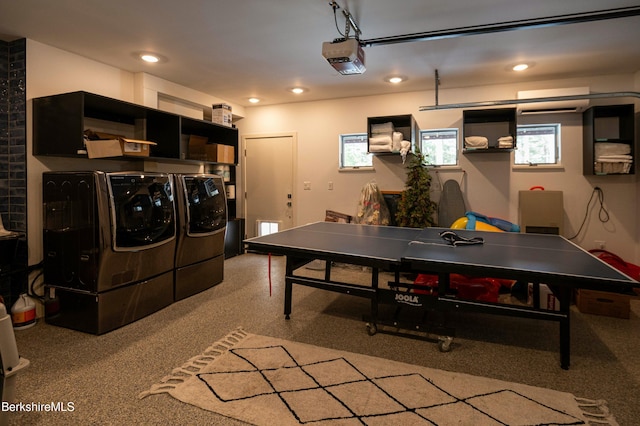 rec room featuring a garage, recessed lighting, light carpet, and washer and clothes dryer