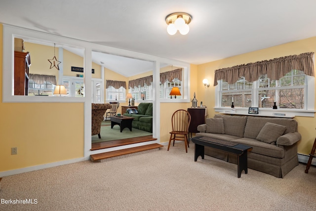 living room featuring carpet floors and vaulted ceiling