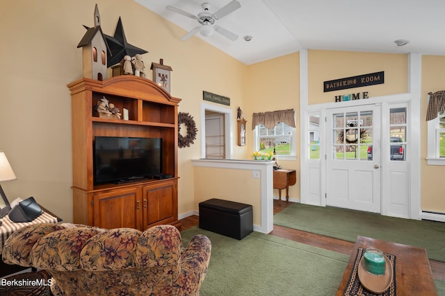 living room featuring dark colored carpet, vaulted ceiling, and ceiling fan