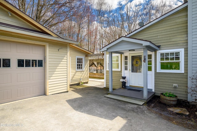 entrance to property featuring a garage