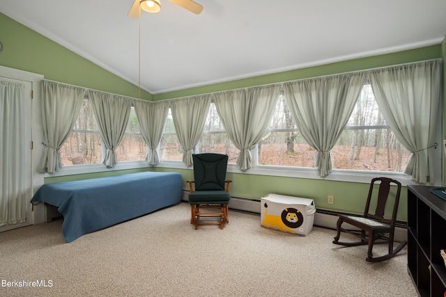 bedroom with carpet, ceiling fan, multiple windows, and vaulted ceiling