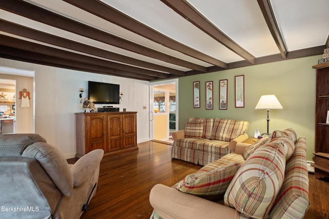 living room featuring beam ceiling and dark hardwood / wood-style flooring