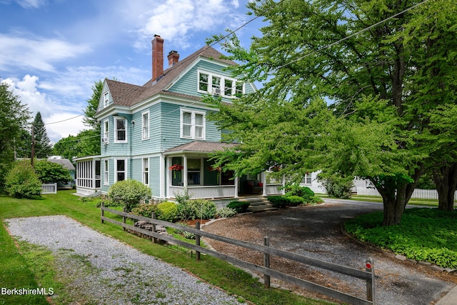 163 Cole Ave, Williamstown, MA 01267 - victorian home featuring driveway, a porch, a chimney, and roof with shingles