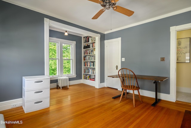 163 Cole Ave, Williamstown, MA 01267 - office space featuring radiator, light wood-type flooring, ceiling fan, crown molding, and built in shelves