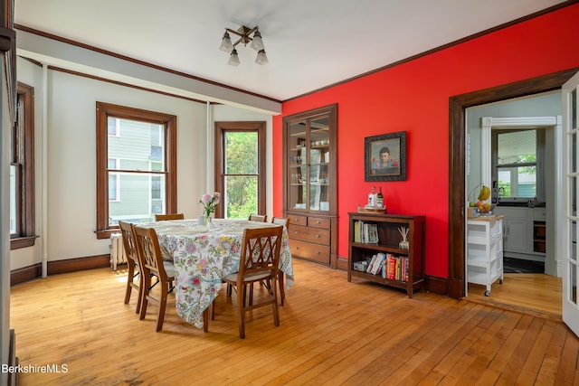 163 Cole Ave, Williamstown, MA 01267 - dining space with light wood-type flooring, plenty of natural light, and crown molding