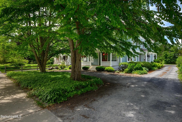 163 Cole Ave, Williamstown, MA 01267 - view of property hidden behind natural elements with covered porch