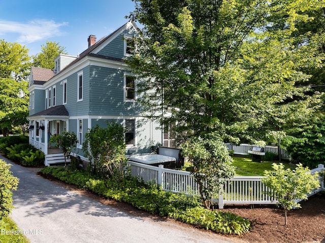 163 Cole Ave, Williamstown, MA 01267 - view of side of property featuring a chimney and roof with shingles