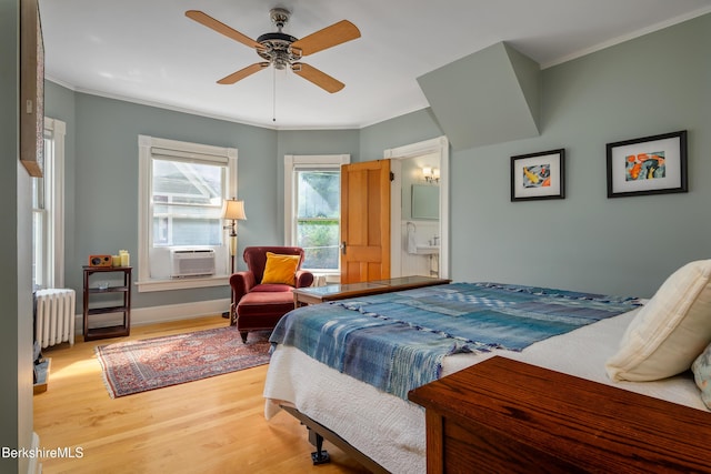 163 Cole Ave, Williamstown, MA 01267 - bedroom featuring radiator, light wood-style flooring, crown molding, cooling unit, and a ceiling fan
