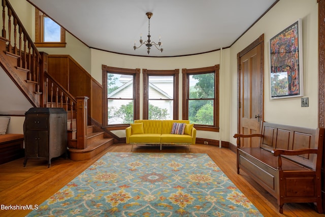 163 Cole Ave, Williamstown, MA 01267 - living area featuring stairway, wood finished floors, and a chandelier