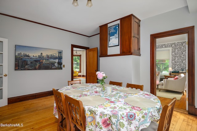 163 Cole Ave, Williamstown, MA 01267 - dining area featuring light wood-type flooring, healthy amount of natural light, and ornamental molding