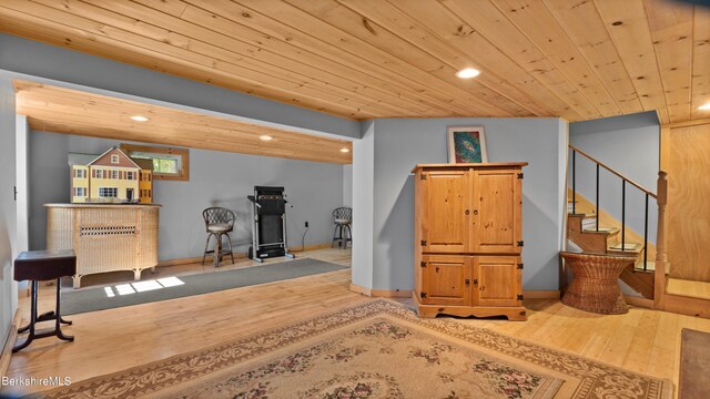 interior space with wood-type flooring and wooden ceiling