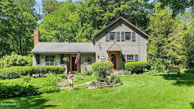 204 Cottage St, Great Barrington, MA 01236 - traditional-style house with a front yard and a chimney