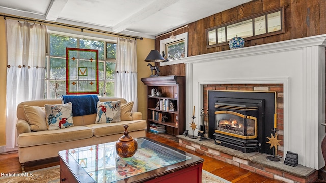 204 Cottage St, Great Barrington, MA 01236 - living area featuring wood finished floors, a fireplace, and beamed ceiling