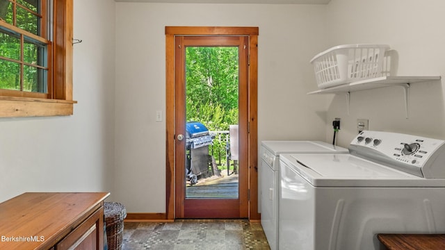204 Cottage St, Great Barrington, MA 01236 - laundry area with washing machine and dryer, baseboards, and stone finish flooring