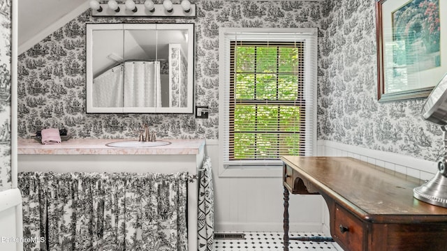 204 Cottage St, Great Barrington, MA 01236 - bathroom with wallpapered walls, vanity, a wainscoted wall, healthy amount of natural light, and baseboards