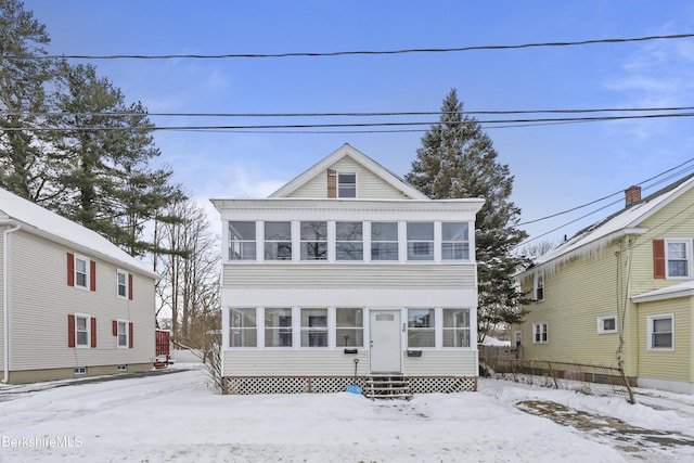 front facade featuring a sunroom