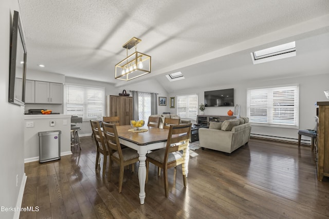 dining space featuring lofted ceiling, dark hardwood / wood-style flooring, plenty of natural light, and baseboard heating