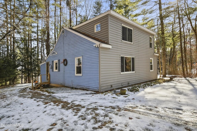 view of snow covered property