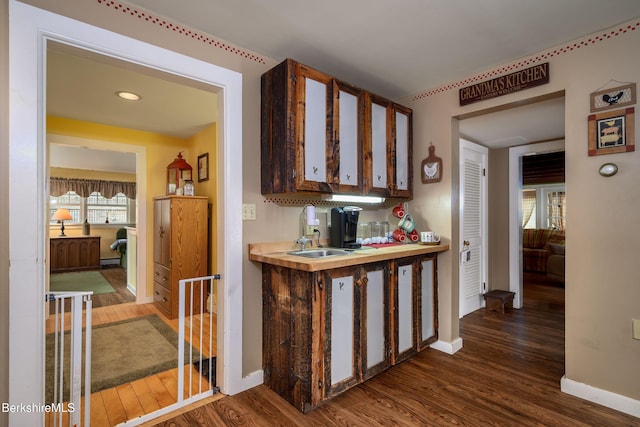 924 Henderson Rd, Williamstown, MA 01267 - kitchen with a sink, baseboards, dark wood-style floors, light countertops, and recessed lighting
