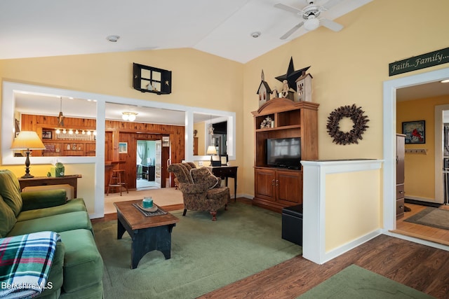 924 Henderson Rd, Williamstown, MA 01267 - living room with wood finished floors, lofted ceiling, ceiling fan, and wooden walls