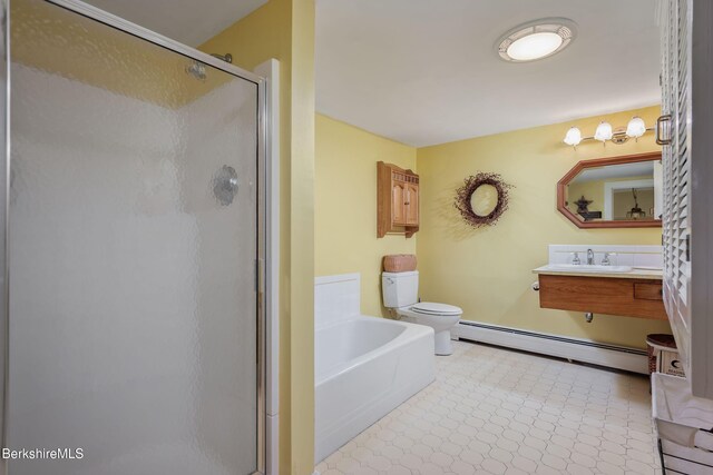 924 Henderson Rd, Williamstown, MA 01267 - bathroom featuring a baseboard heating unit, a sink, a shower stall, toilet, and a bath