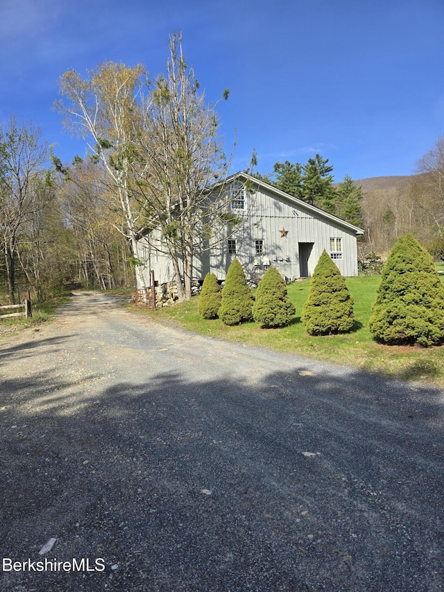 924 Henderson Rd, Williamstown, MA 01267 - view of side of home featuring board and batten siding and gravel driveway