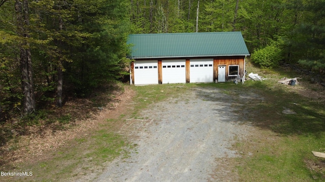924 Henderson Rd, Williamstown, MA 01267 - detached garage with a forest view and dirt driveway