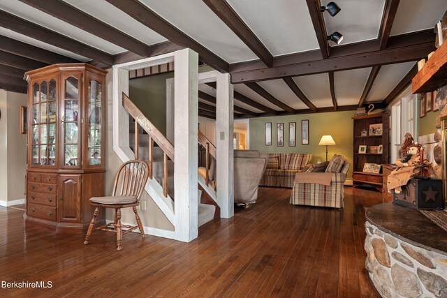 924 Henderson Rd, Williamstown, MA 01267 - living area with stairway, beam ceiling, wood-type flooring, and baseboards