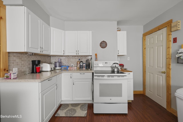 kitchen featuring white electric stove, backsplash, dark wood finished floors, and white cabinets