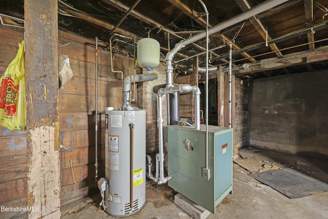 utilities with gas water heater and a heating unit