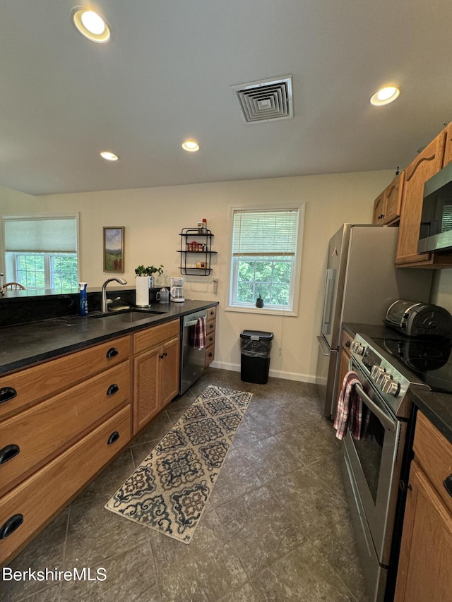 kitchen featuring sink and appliances with stainless steel finishes