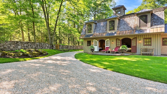 232 Giberson Rd, Sheffield, MA 01257 - rear view of property with a porch, board and batten siding, a standing seam roof, metal roof, and a lawn