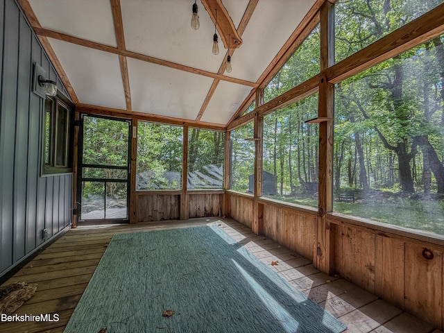 110 Access Rd, Becket, MA 01223 - unfurnished sunroom featuring lofted ceiling, wooden walls, and hardwood / wood-style floors