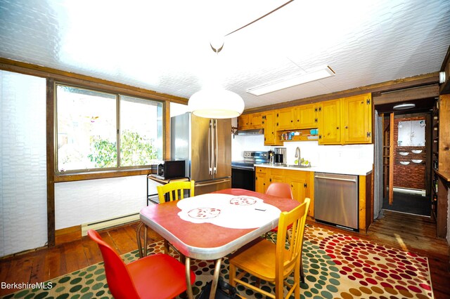 110 Access Rd, Becket, MA 01223 - dining area featuring baseboard heating and dark wood finished floors
