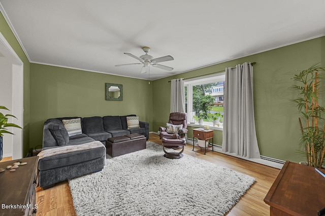 927 Holmes Rd, Pittsfield, MA 01201 - living area with wood finished floors, ceiling fan, and ornamental molding