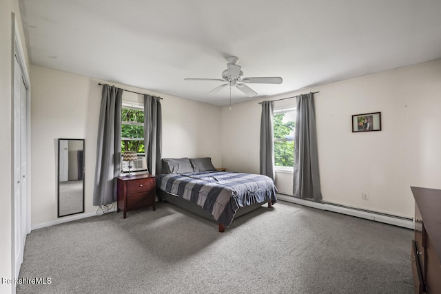 927 Holmes Rd, Pittsfield, MA 01201 - carpeted bedroom with a baseboard heating unit, multiple windows, a ceiling fan, and cooling unit
