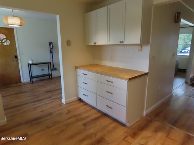 19 Grandview Ter, Adams, MA 01220 - kitchen featuring wooden counters, light wood finished floors, white cabinetry, and baseboards