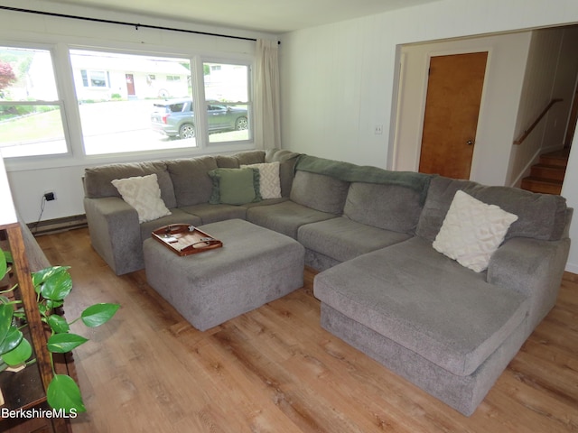 19 Grandview Ter, Adams, MA 01220 - living area featuring light wood finished floors, stairway, and baseboard heating