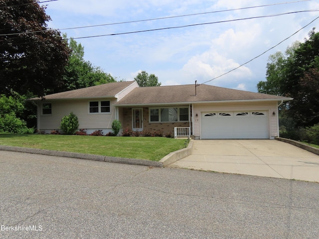 19 Grandview Ter, Adams, MA 01220 - view of front of home featuring concrete driveway, an attached garage, and a front yard