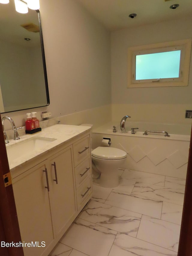 19 Grandview Ter, Adams, MA 01220 - bathroom featuring vanity, marble finish flooring, a garden tub, toilet, and recessed lighting